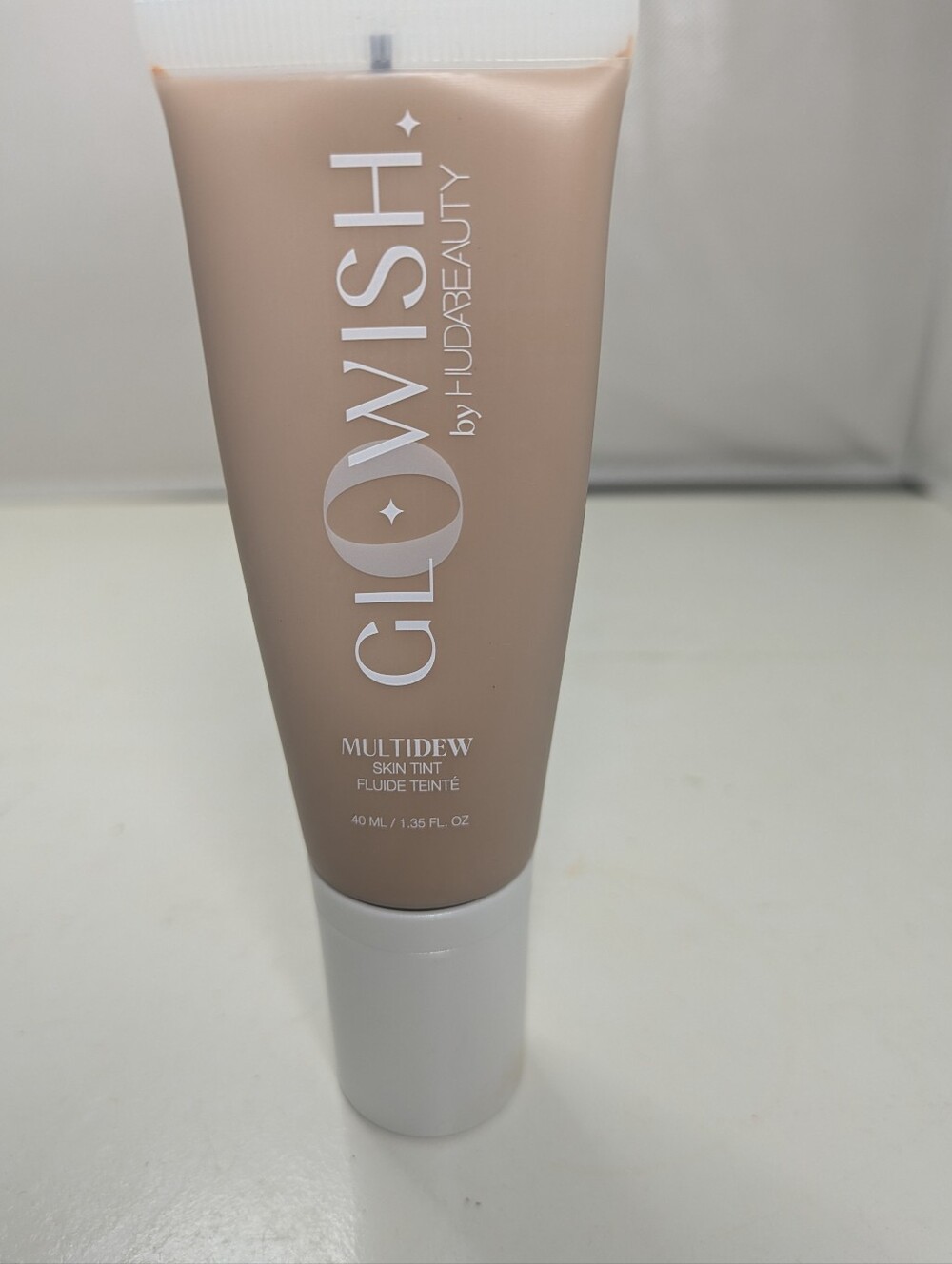 HUDA BEAUTY GLOWISH Multi Dew Skin Tint 07 Tan Light